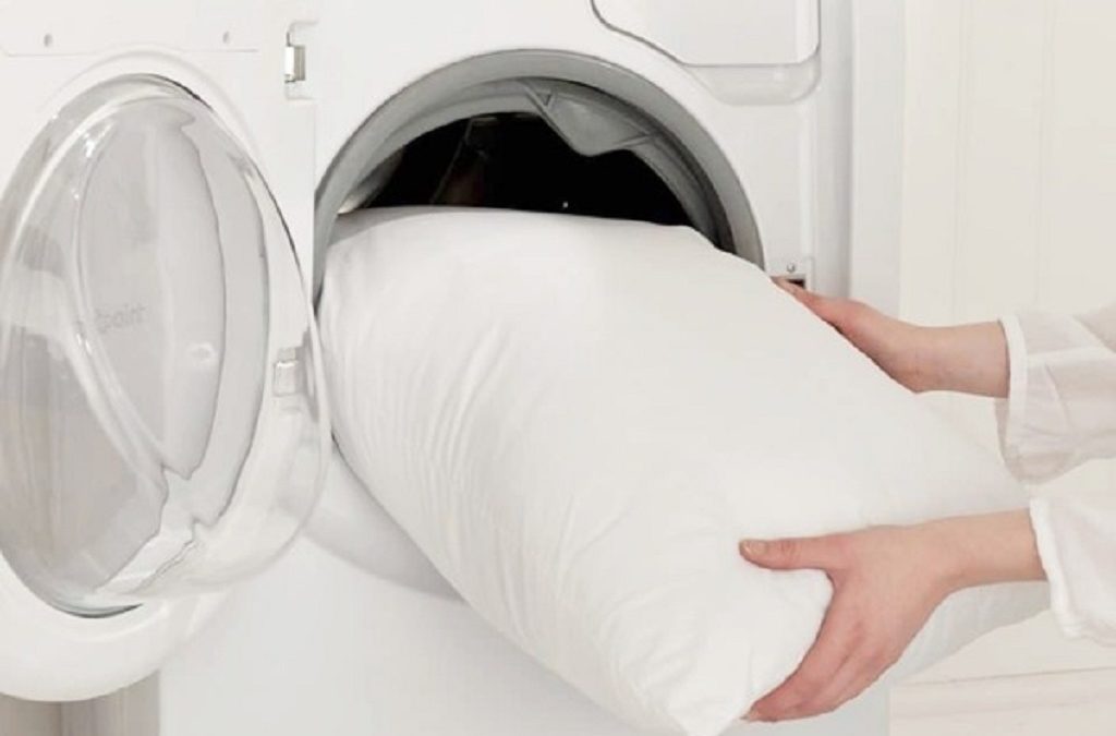 Why does my pillow smell after washing wash down and feather pillows