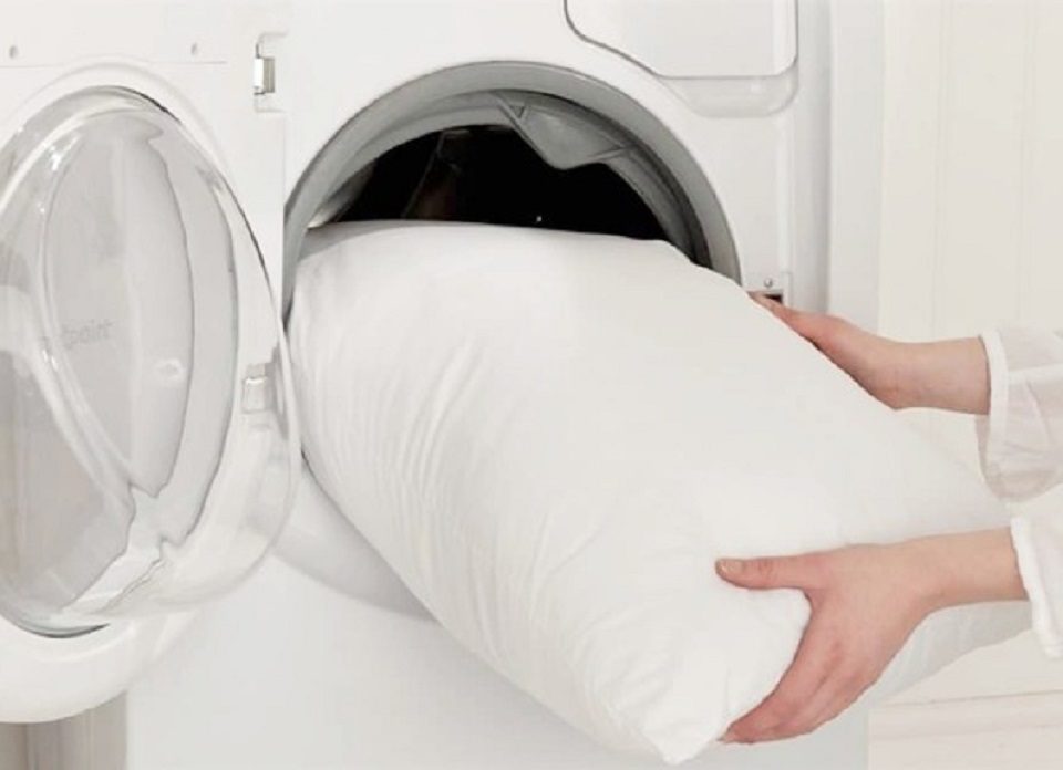 Why does my pillow smell after washing wash down and feather pillows