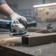 Bosch GWS8-45 angle grinder in use cutting metal