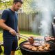 Home griller using long-handled tongs to cook meat on a charcoal grill in a backyard