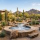 Phoenix backyard spa with desert landscaping